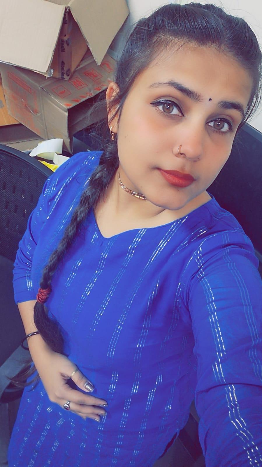Suhani wearing a blue outfit